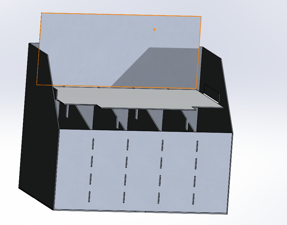 Perspective CAD view of the accumulator enclosure with internal dividers and electronics shelf